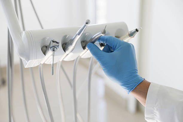 Professional Tooth Extraction technician working in Danville, AR